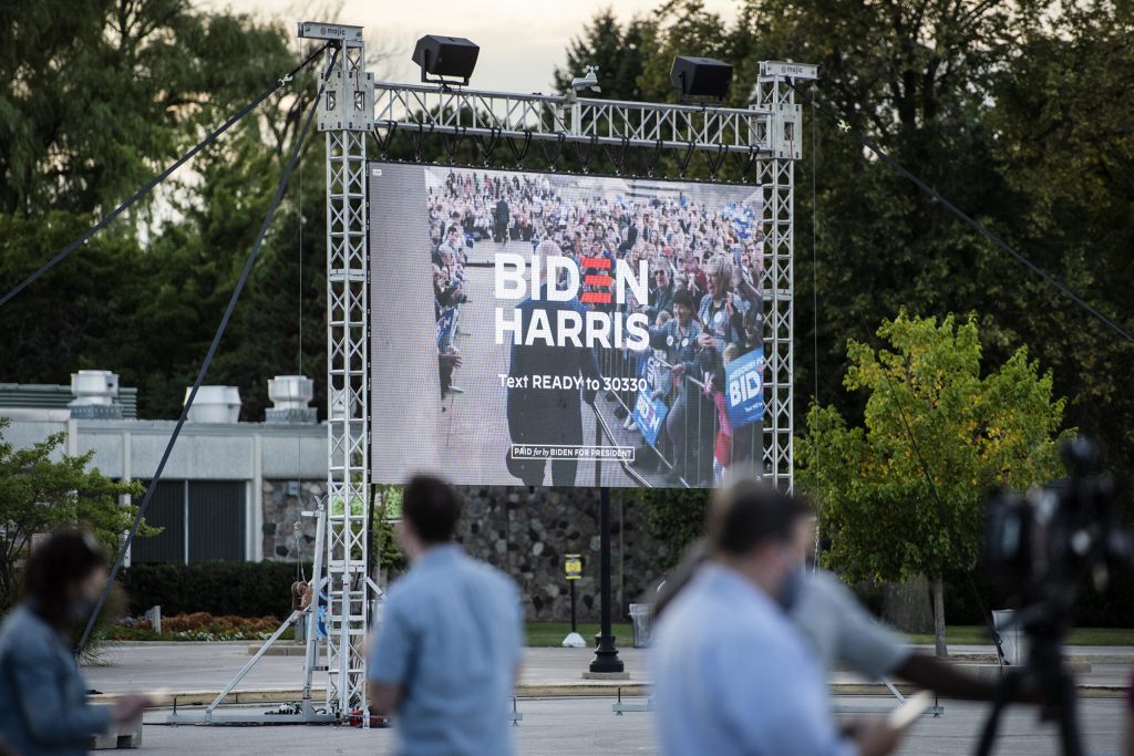 A video is played before the virtual DNC at a drive-in event Thursday, Aug. 20, 2020, at the Milwaukee County Zoo. Angela Major/WPR
