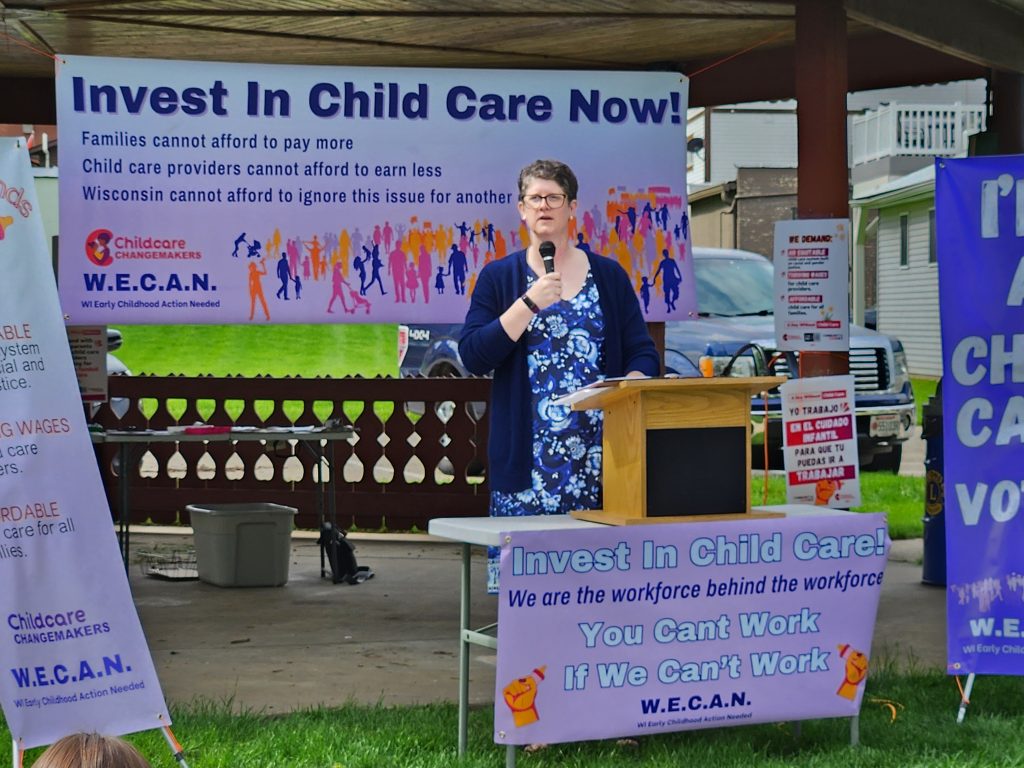 Wisconsin Department of Public Instruction Superintendent Jill Underly addresses a rally in New Glarus to support a stronger state investment in child care. (Wisconsin Examiner photo)