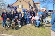 Common Ground workers and public housing residents gather at a news conference held in April in front of the residence of HACM Board Chair Sherri Reed Daniels. Photo by PrincessSafiya Byers/NNS.