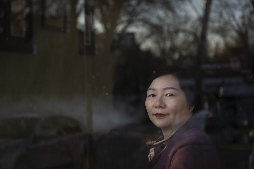 Shi Minglei, the wife of imprisoned Chinese human rights activist Cheng Yuan, is shown in Minneapolis on Feb. 19, 2023. Shi applauded a U.S. Customs and Border Protection order to restrict imports of work gloves manufactured by a Chinese company accused of relying on forced prison labor to manufacture Milwaukee Tool-branded gloves. (Ariana Lindquist for Wisconsin Watch)