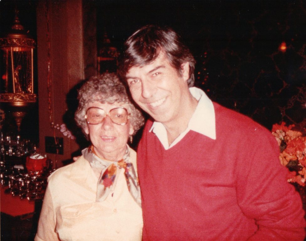 June Brehm and her son Joe Brehm pose for a photo at This is It! bar in Milwaukee. June Brehm opened the bar in 1968 and began photographing patrons. Thousands of those photos were recently donated to the Wisconsin LGBTQ History Project for preservation. Photo courtesy of the Wisconsin LGBTQ History Project