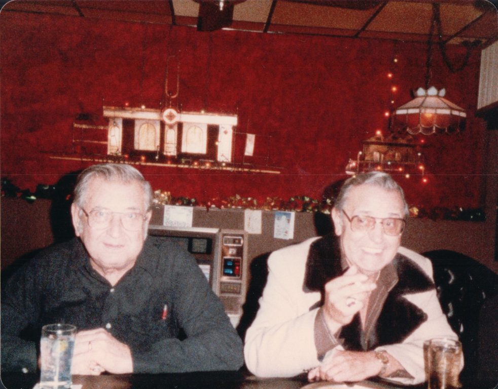 Two men smile for a photo at This is It! bar in Milwaukee. Thousands of photos of the city’s first gay bar were recently donated to the Wisconsin LGBTQ History Project for preservation. Photo courtesy of the Wisconsin LGBTQ History Project