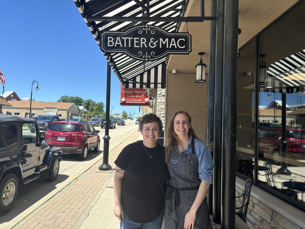 Kasey Gusho and Brittany Wohlfeil stand outside the bakery they co-own in Menomonee Falls on June 5, 2024. Margaret Faust/WPR