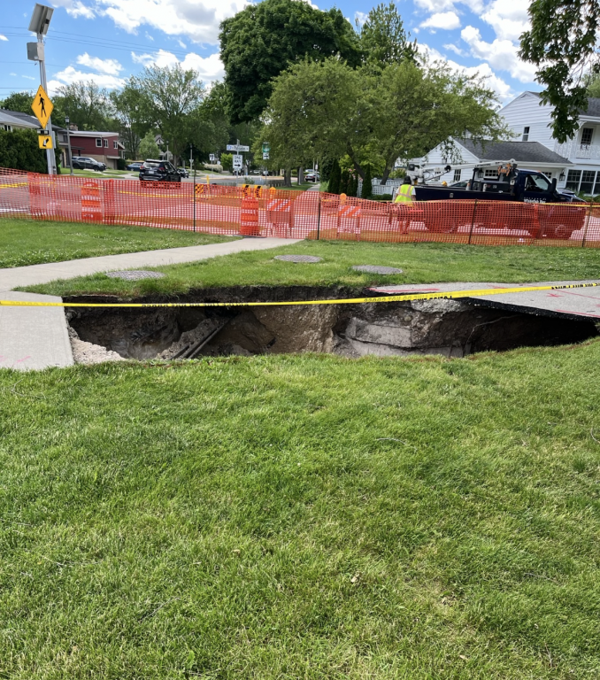 The sinkhole opened up over the weekend where Big Bay Park and Buckley Park connect. Photo courtesy of Matt Collins