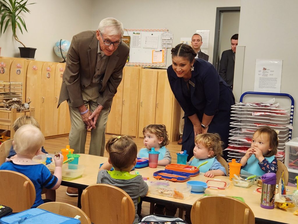 Gov. Tony Evers visits Mariposa Learning Center in Fitchburg on Sept. 20, 2023, to emphasize the need for more child care funding in Wisconsin. A new report from the Wisconsin Department of Children and Families finds that child care has become less affordable in the state. (Erik Gunn | Wisconsin Examiner)