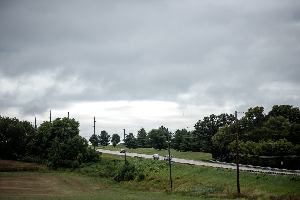 Cars drive under storm clouds Monday, Aug. 14, 2023, in Footville, Wis. Angela Major/WPR