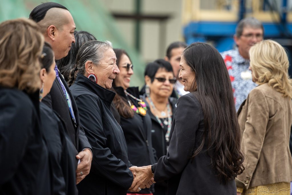 Secretary of the Interior Deb Haaland shakes hands with Menominee Tribe leadership Tuesday Oct. 10, 2023, in Neopit, Wis. Angela Major/WPR