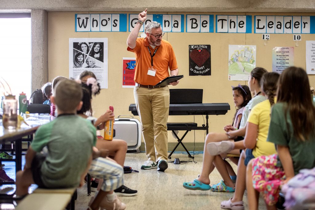 John Bragle, senior director of education for the Wisconsin Conservatory of Music, gives students instructions on singing Thursday, June 27, 2024, at Henry David Thoreau Elementary School in Milwaukee, Wis. Angela Major/WPR