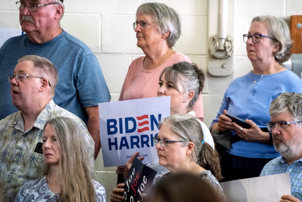 Supporters listen as President Joe Biden speaks Friday, July 5, 2024, at Sherman Middle School in Madison, Wis. Angela Major/WPR