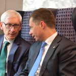 Pete Buttigieg Tours Port With Mayor, Rides Train With Governor