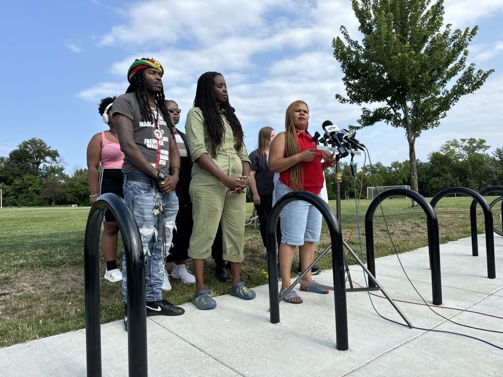 Tamika Johnson, right, speaks during a press conference announcing how many signatures have been collected for a recall effort against four MPS school board members on Wednesday, July 24, 2024. Evan Casey/WPR