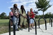 Tamika Johnson, right, speaks during a press conference announcing how many signatures have been collected for a recall effort against four MPS school board members on Wednesday, July 24, 2024. Evan Casey/WPR