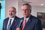 Wisconsin Republican Party Chair Brian Schimming, right, with  state Treasurer John Leiber, declares Monday that Republicans  are “unified behind Donald Trump” at a Wisconsin delegation breakfast Monday morning. (Baylor Spears | Wisconsin Examiner)
