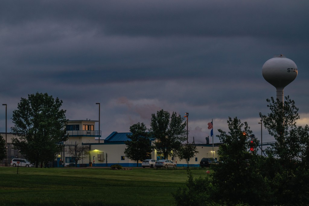 Nightfall descends on The Stanley Correctional Institution on June 9, 2024, in Stanley, Wis. Of the 60 staff physicians employed by the Wisconsin Department of Corrections over the past decade, 17 have been censured by a state board for an error or a breach of ethics. (Jamie Kelter Davis for The New York Times)