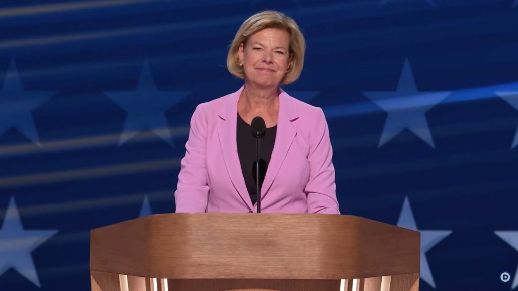 Sen. Tammy Baldwin at the Democratic National Convention podium Thursday evening, where she spoke about protecting Social Security. (Screenshot | Democratic National Convention YouTube channel)