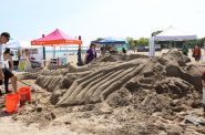 Sculptors create a massive sea creature at Bradford Beach. Photo taken Aug. 21, 2024 by Sophie Bolich.