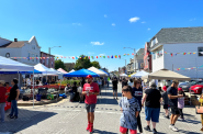 Vendor booths and attendees at Silver City Fest. Photo courtesy of VIA CDC.