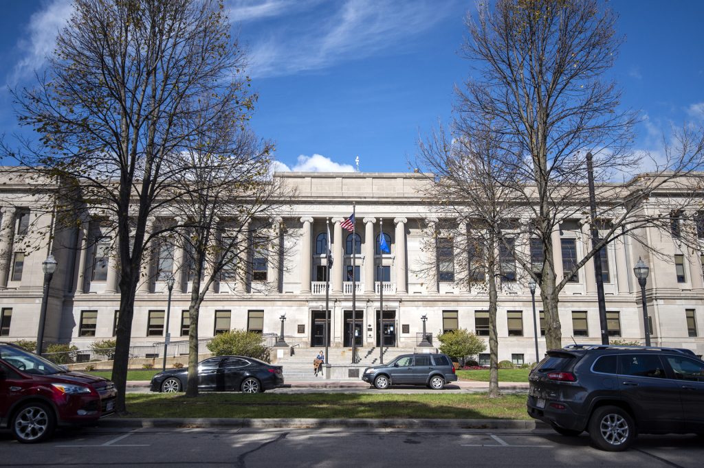 Cars are parked outside the Kenosha County Courthouse on Tuesday, Oct. 26, 2021, in Kenosha, Wis. Angela Major/WPR