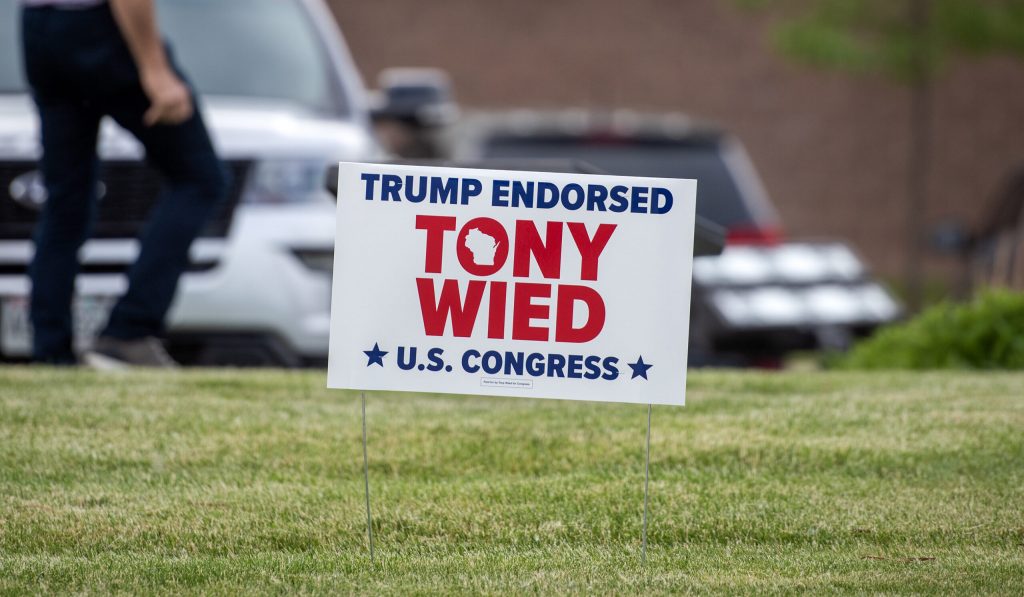A sign for Republican congressional candidate Tony Wied outside of a campaign event Tuesday, June 4, 2024, in De Pere, Wis. Angela Major/WPR