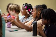 Students participate in choir practice Thursday, June 27, 2024, at Henry David Thoreau Elementary School in Milwaukee, Wis. Angela Major/WPR