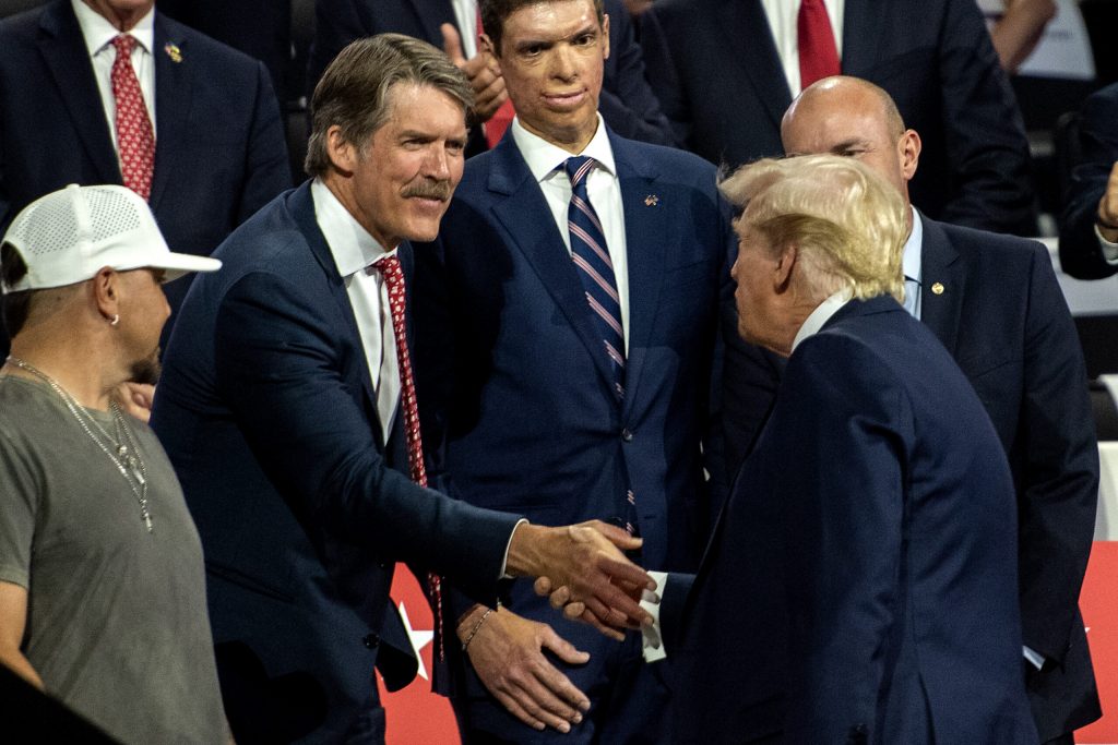 Former President Donald Trump shakes hands with Senate candidate Eric Hovde on Thursday, July 18, 2024, at the Fiserv Forum in Milwaukee, Wis. Angela Major/WPR