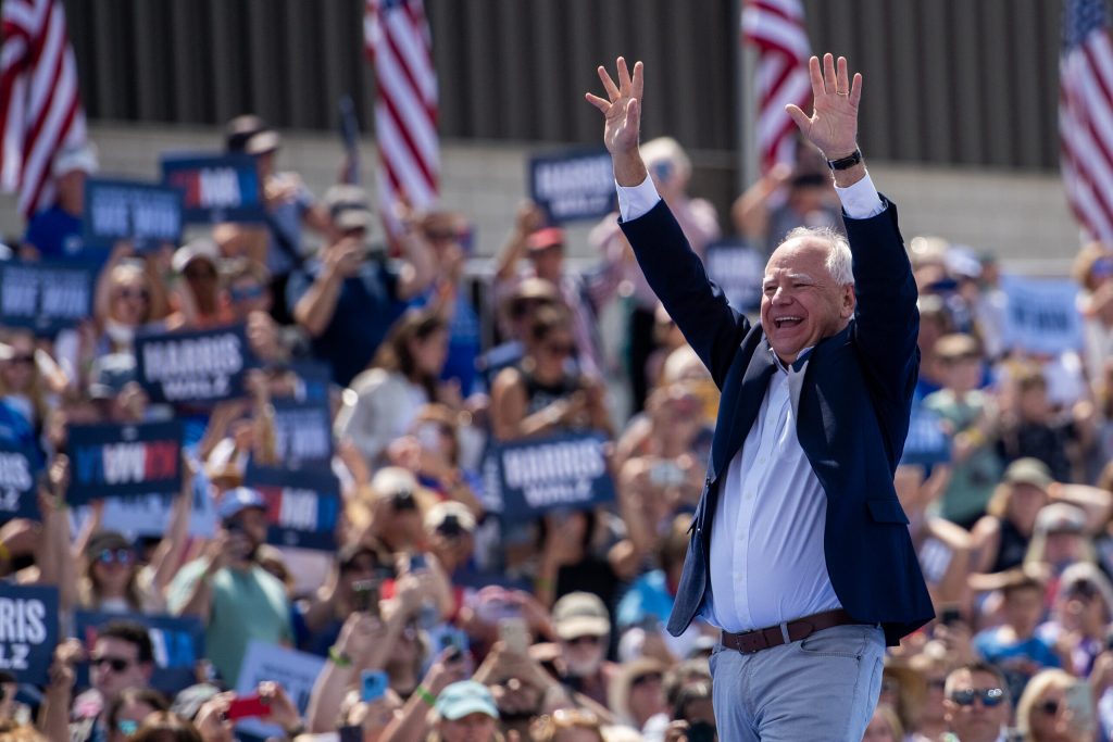 Minnesota Gov. Tim Walz greets the crowd at a political rally with Vice President Kamala Harris on Wednesday, Aug. 7, 2024, in Eau Claire, Wis. Angela Major/WPR