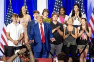 Former President Donald Trump speaks at a town hall Thursday, Aug. 29, 2024, at the La Crosse Center in La Crosse, Wis. He took questions from the people pictured here behind him. Angela Major/WPR