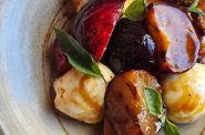 Grilled peaches and plums with bocconcini, Thai basil and ponzu reduction from Mother's. Photo courtesy of Vanessa Rose.