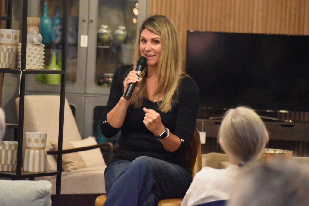 OB-GYN Dr. Kristin Lyerly speaks to voters at a Town Hall in Appleton on July 2, 2024. Lyerly is the only Democrat running for Wisconsin’s 8th Congressional District, a seat held by Republicans for more than a decade. Joe Schulz/WPR