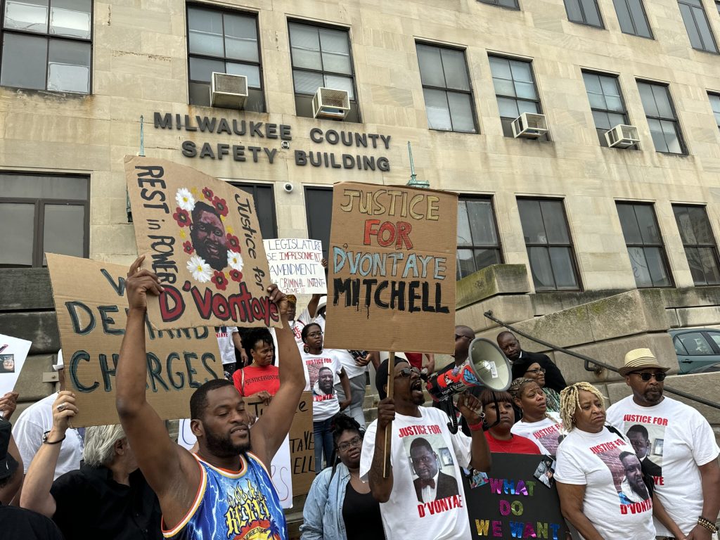 The family of D’Vontaye Mitchell hold a rally on Monday, Aug. 5, 2024. Evan Casey/WPR