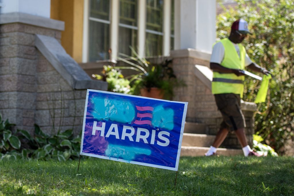 Volunteers knock doors in a Milwaukee neighborhood in an effort to reach voters Tuesday, Sept. 3, 2024. Angela Major/WPR