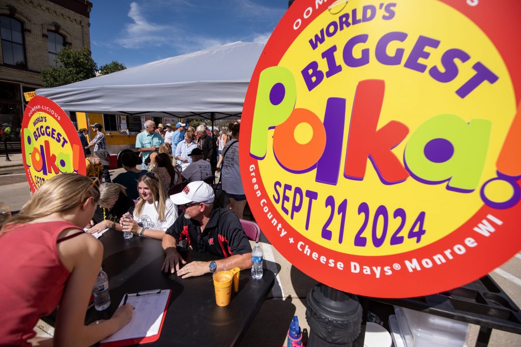 Participants sign up to try to break the world record for biggest polka dance Saturday, Sept. 21, 2024, in Monroe, Wis. Angela Major/WPR