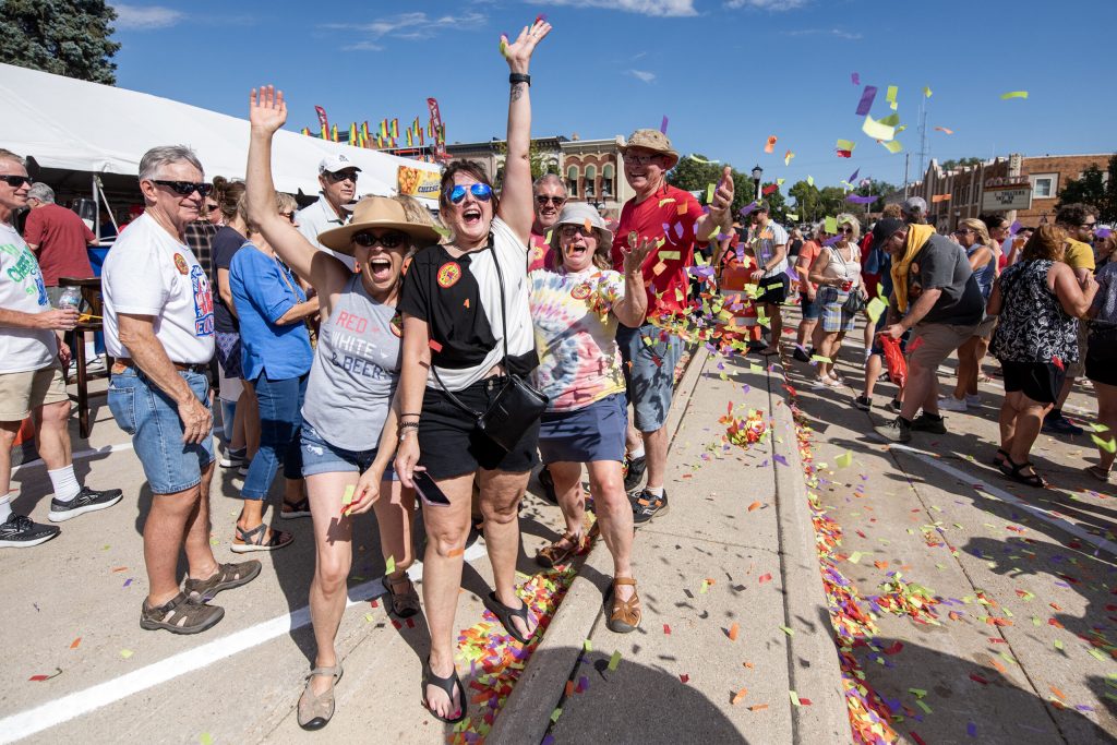 Attendees cheer as the potentially world record breaking polka dance is completed Saturday, Sept. 21, 2024, in Monroe, Wis. Angela Major/WPR