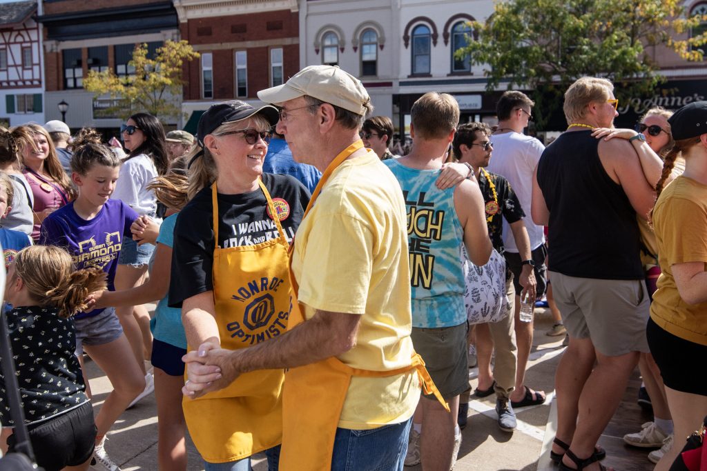 People warm up before the potentially world record breaking polka dance at Green County Cheese Days on Saturday, Sept. 21, 2024, in Monroe, Wis. Angela Major/WPR