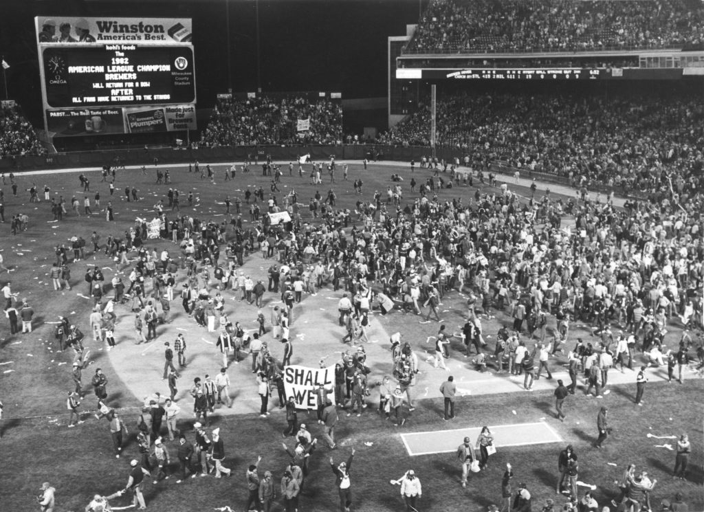 Fans rush the field in County Stadium after the Milwaukee Brewers defeated the California Angels on October 10, 1982. Photo courtesy Derek Beamer and Cannonball Production