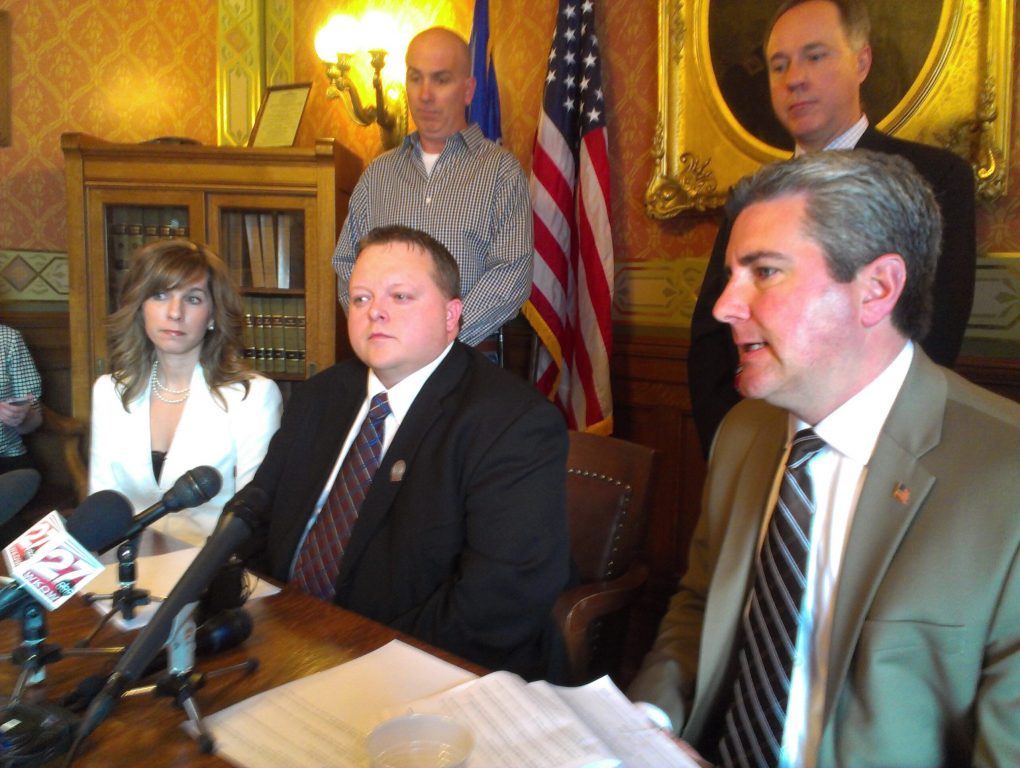 A press briefing for the bill. Moving clockwise, starting with the woman on the far left: Sally Schaeffer, Rep. Scott Krug, Rep. Rob Kahl, Speaker Robin Vos, and Tom Schaeffer. Photo: Shawn Johnson/WPR.