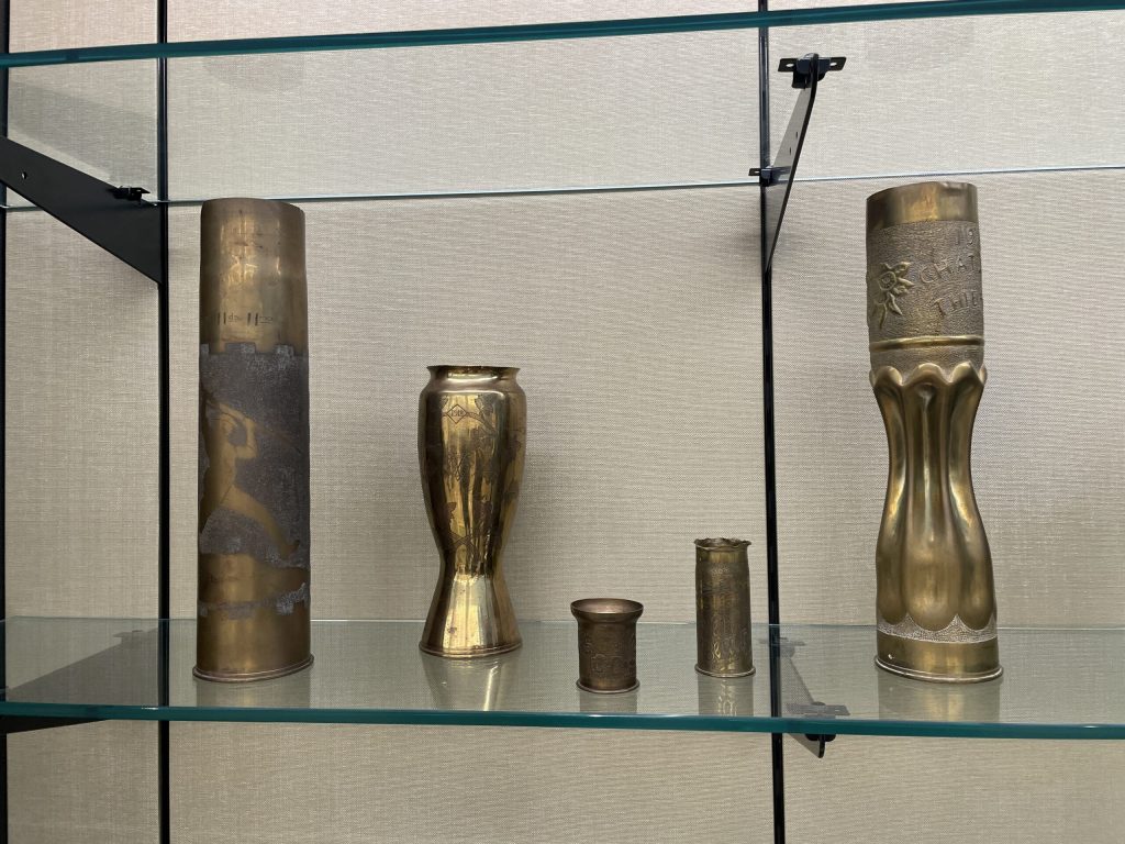 World War I trench art in a display case at Mission94, on loan from the Pritzker Military Archives Center. Nick Rommel/WPR