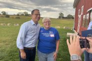 Pennsylvania Gov. Josh Shapiro and Lafayette County Democratic volunteer irene kendall. Shapiro campaigned in rural Wisconsin for Sen. Tammy Baldwin’s reelection Saturday. | Wisconsin Examiner photo