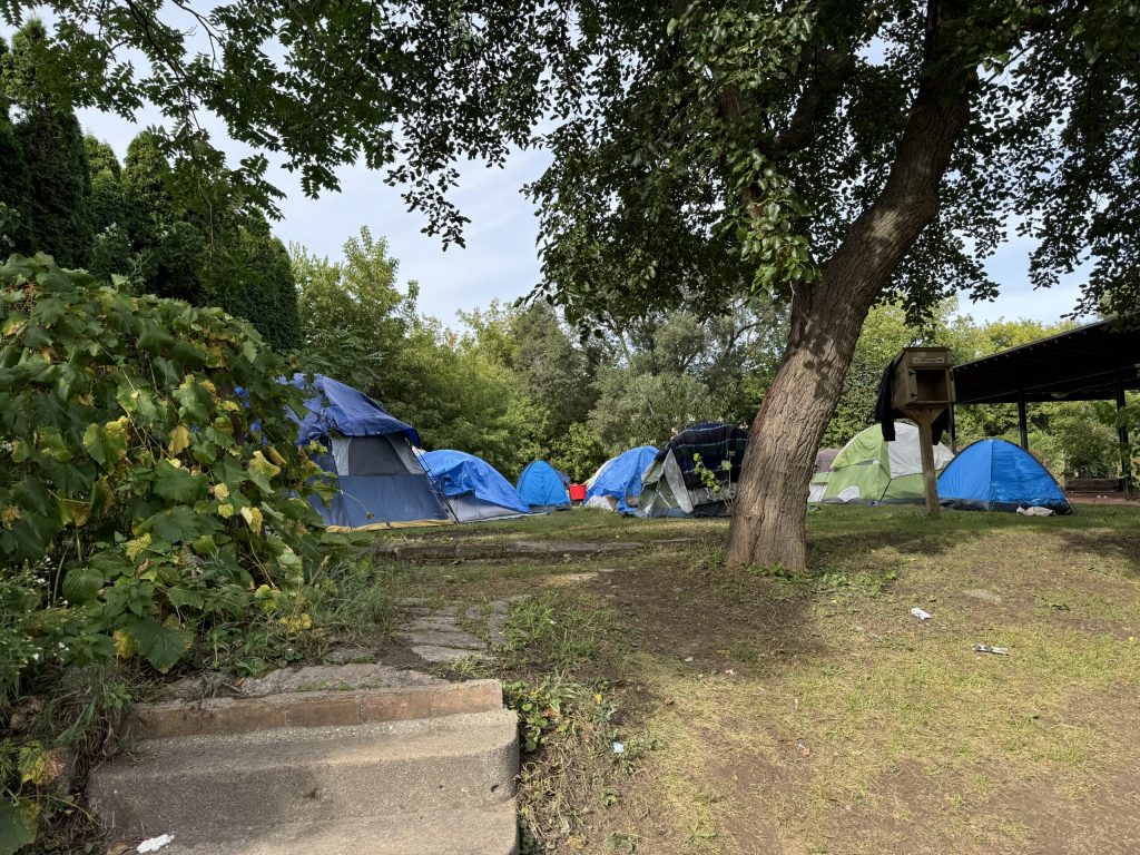 A homeless encampment can be seen here on the property of the Guest House in Milwaukee. Evan Casey/WPR