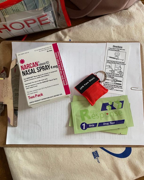 A “hope kit” is shown that includes naloxone, CPR face shields, fentanyl testing strips  and contact information for groups who seek to reduce drug overdoses in Milwaukee. The kits were developed by the Milwaukee Overdose Response Initiative, a partnership between the Milwaukee Health Department, the Milwaukee Fire Department and other groups that seeks to decrease the chances of drug overdoses. Substance abuse, particularly involving opioids like fentanyl, is the leading cause of death among people experiencing homelessness in Milwaukee County. Photo courtesy of MKE Overdose Prevention