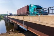 A semitruck on the Highway 12 bridge crossing over the Wisconsin River in Sauk City, Wis. on June 11, 2021. Bill Martens/WPR