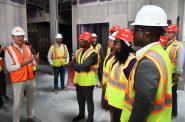 Engberg Anderson partner Bill Robison explains details about the new Coggs Center to Mayor Cavalier Johnson, County Board Chair Marcelia Nicholson, Congresswoman Gwen Moore and County Executive David Crowley. Photo by Jeramey Jannene.