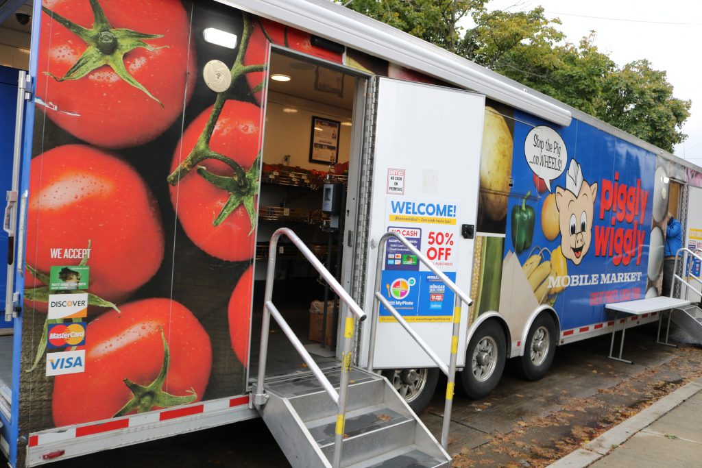 Hunger Task Force's Mobile Market parked near Mitchell Court apartments, 2600 W. National Ave. Photo taken Nov. 6, 2024 by Sophie Bolich.