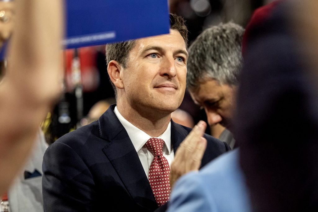 Rep. Bryan Steil stands with the Wisconsin delegation during the second day of the RNC on Tuesday, July 16, 2024, at the Fiserv Forum in Milwaukee, Wis. Angela Major/WPR