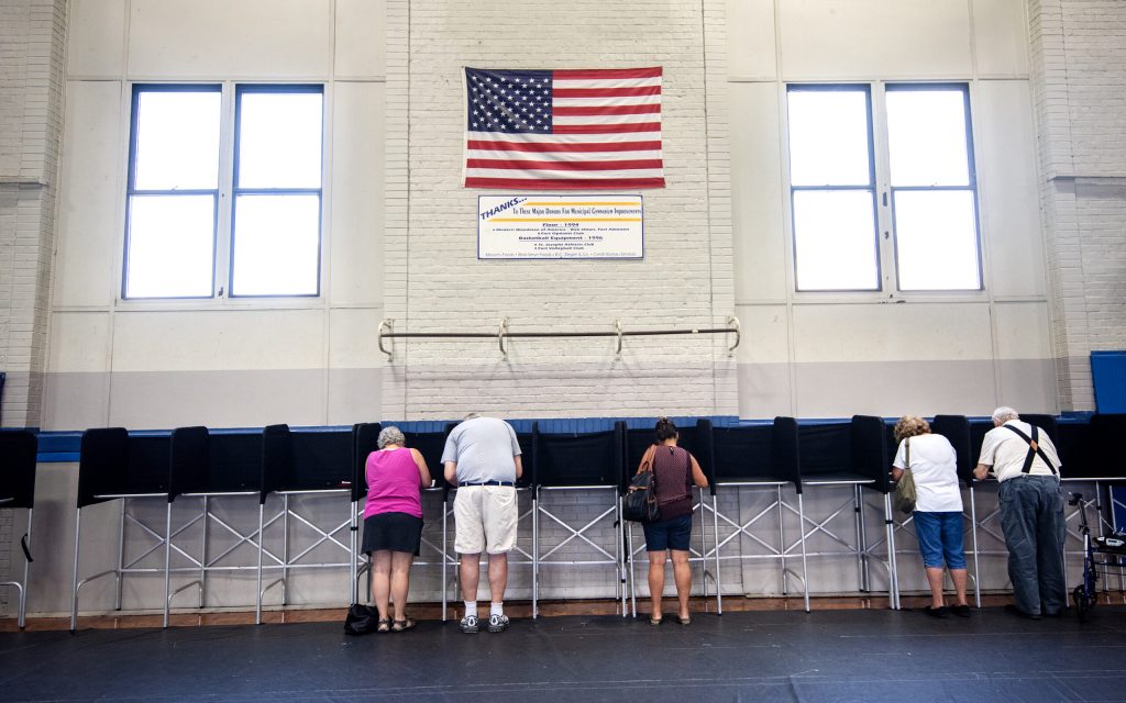 Voters fill out ballots Tuesday, Aug. 13, 2024, in Fort Atkinson, Wis. Angela Major/WPR