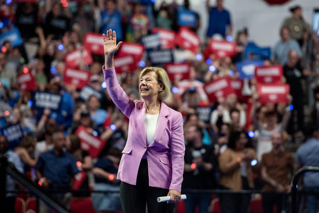 Sen. Tammy Baldwin takes the stage Friday, Sept. 20, 2024, during a rally for Vice President Kamala Harris at the Alliant Energy Center in Madison, Wis. Angela Major/WPR