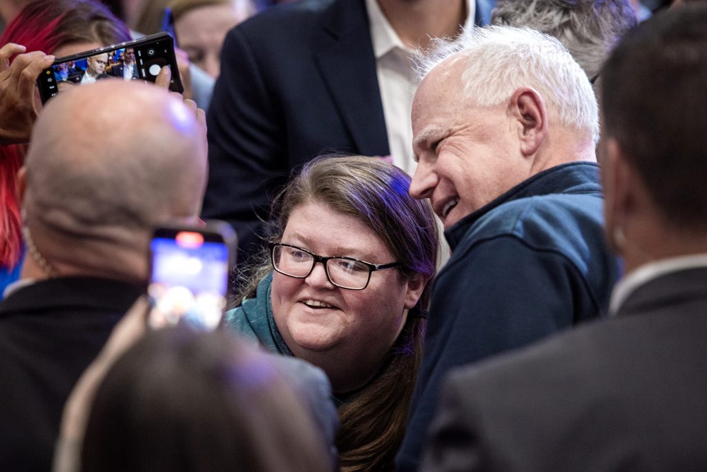 Gov. Tim Walz poses with a supporter in the crowd after speaking Monday, Oct. 14, 2024, in Green Bay, Wis. Angela Major/WPR