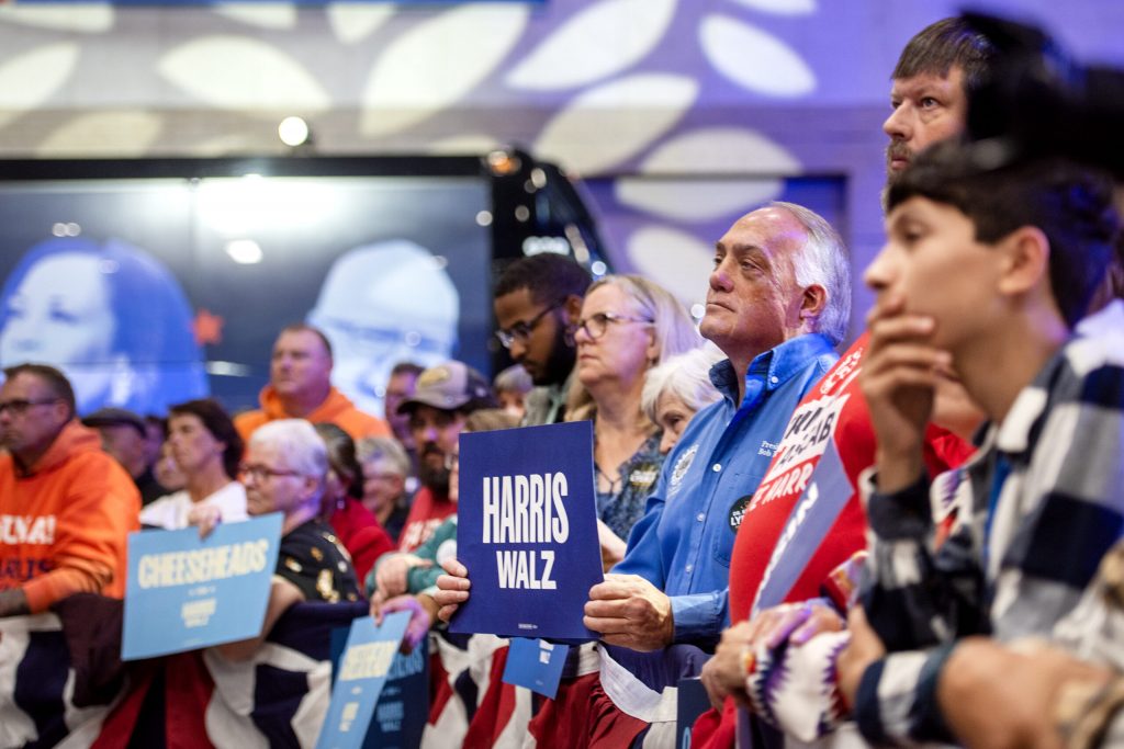 Supporters watch as Gov. Tim Walz speaks during a campaign rally Monday, Oct. 14, 2024, in Green Bay, Wis. Angela Major/WPR