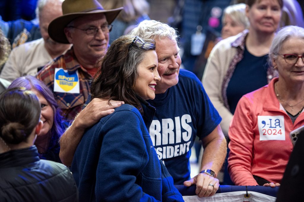 Gov. Gretchen Whitmer takes photos with supporters after a campaign rally with Gov. Tim Walz and Gov. Tony Evers on Monday, Oct. 14, 2024, in Green Bay, Wis. Angela Major/WPR