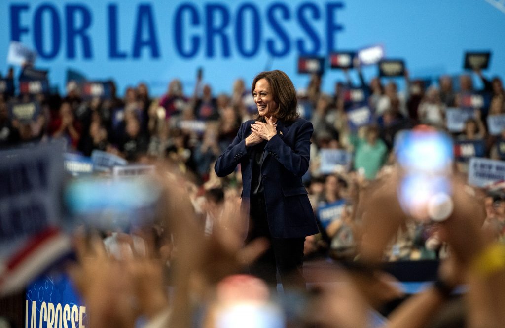 Vice President Kamala Harris walks on stage for a campaign rally as supporters cheer Thursday, Oct. 17, 2024, at UW-La Crosse, Wis. Angela Major/WPR